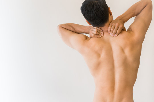 Woman With Upper Back And Neck Pain Standing Naked With Her Back