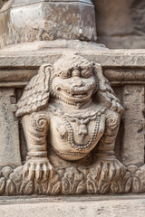 Obraz premium A stone lion carved into a temple step in Bhaktapur, Nepal.