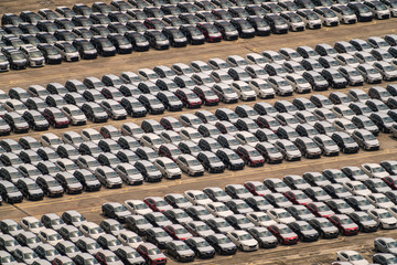 Import cars lined up at container terminal