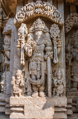 A carving of the Hindu God Brahma at the 13th Century temple of Somanathapur, Karnataka, South India.
