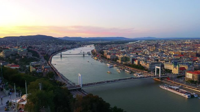 Budapest city panorama at dusk with Gellert Hill in foreground