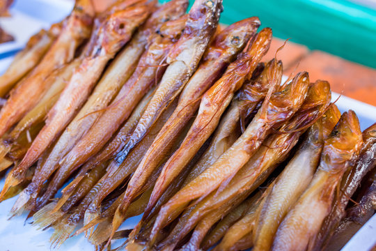 Baikal fish hot smoked and dried on the street market. Listvyanka, Siberia, Russia