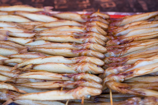 Baikal fish hot smoked and dried on the street market. Listvyanka, Siberia, Russia