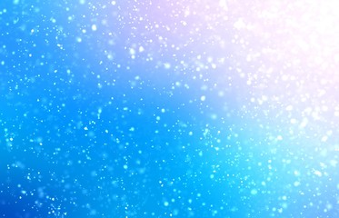 Bright blue sky background. Snowfall texture. Winter pattern.