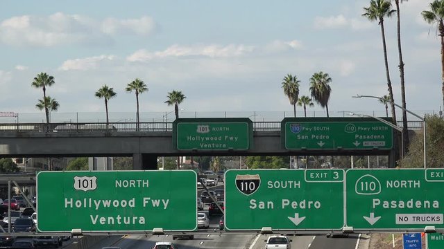 Road signs on a Los Angeles freeway