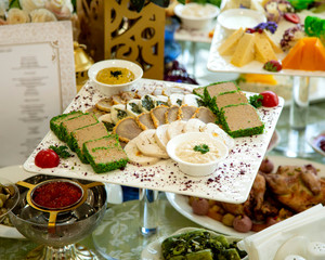 meat pate platter served with sauces