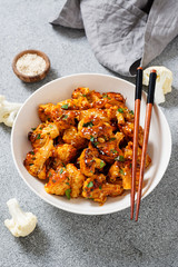 Buffalo Cauliflower . Popular Baked Cauliflower with barbeque sauce. Barbecue Cauliflower Wings . Vegan Food.