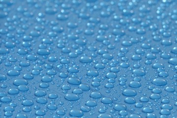Rain drops on the blue PVC  suface
