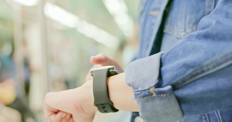 woman look wearable smart watch