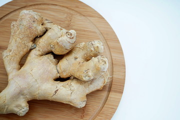 Ginger root isolated on light background. Healthy eating, weight loss, diet