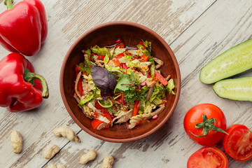 Caucasian Eastern European cuisine. Georgian restaurant salad. The photograph lay flat on the table.
