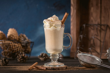 Eggnog cocktail with cinnamon for Christmas holidays