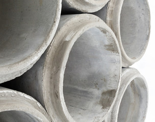 Stack of new concrete pipes.