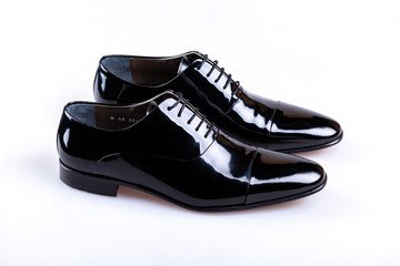 pair of black sneakers isolated on white background