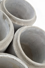 Stack of new concrete pipes.
