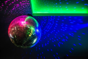disco ball on green background