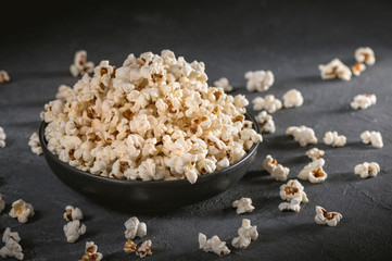 Homemade popcorn on the dark background