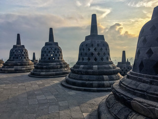 Borobudur sacred temple, stunning ancient temple with black stone bells (stupa) in yogyakarta, Java, Indonesia.