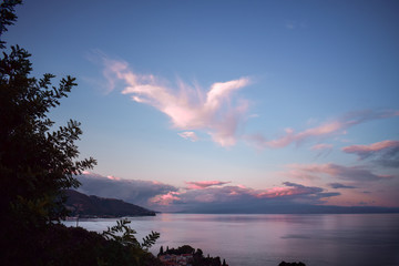 Fototapeta na wymiar Sunset with a view in Taormina, Sicily, Italy