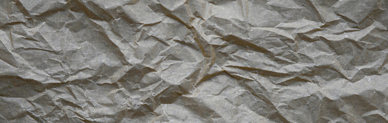 Abstract crumpled baking paper background. Top view of old brown beige Paper textures backgrounds for design, invitation, decorative paper texture vertical concept.