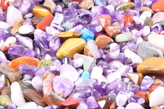pile of semi precious jewelry stones closeup