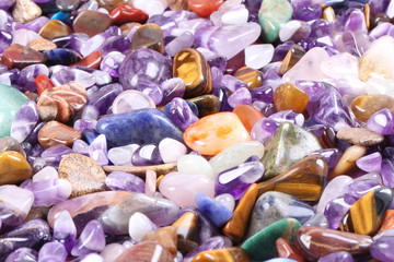 pile of semi precious jewelry stones closeup