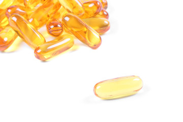 Fish oil supplement isolated on white background