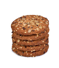 oatmeal cookies with sunflower seeds and sesame isolate on white.Entire image in sharpness.