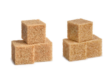 pieces of cane sugar isolate on white.Entire image in sharpness.