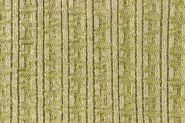 Knitted background.  Knitting Pattern. A sample of knitting from wool.
