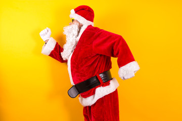 Santa Claus running or jumping happy