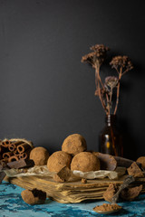 Craft chocolate truffles on a dark background