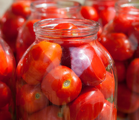 Fototapeta na wymiar Pickling (canning) the tomatoes.