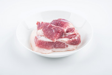 Piece of fresh pork on white background