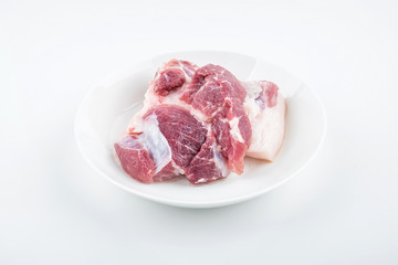 Piece of fresh pork on white background