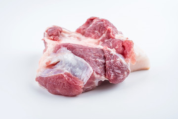 Piece of fresh pork on white background