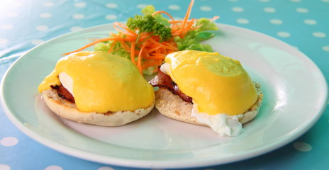 Eggs Benedict- toasted English muffins, poached eggs, and delicious buttery hollandaise sauce
