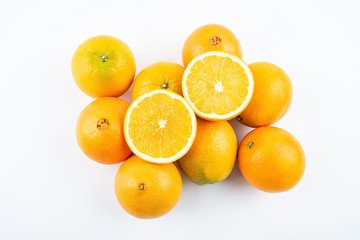 Obraz na płótnie Canvas Fresh Nangan Navel Orange and pulp slices on white background