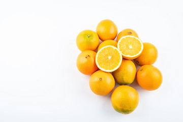 Fresh Nangan Navel Orange and pulp slices on white background