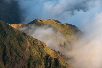 Clouds and mist floating in the mountain valley at sunset, Mulayit Taung, Moei Wadi, Myanmar