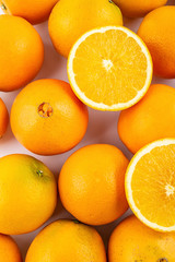 Fresh Nangan Navel Orange and pulp slices on white background