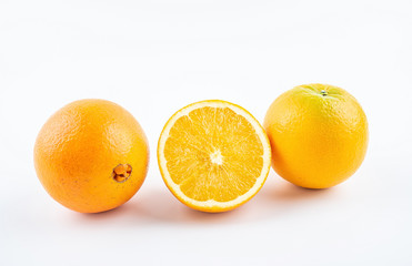 Fresh Nangan Navel Orange and pulp slices on white background