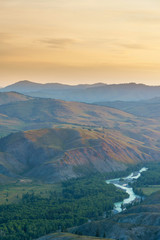 Obraz premium Mountain ranges with sky of sunset and valley river