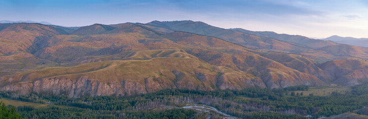 Colorful mountain range with valley forest river