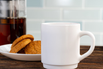 Tea served on a wooden kitchen table
