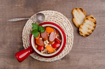 Stewed beans with sausages