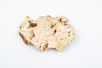 Chinese traditional medicinal herbs atractylodes tablets on white background