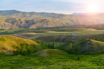 Fototapeta premium Landscape of alpine meadow with sunrise scenery