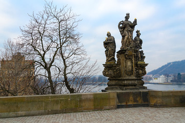 Fototapeta na wymiar Sculptural compositions of Charles Bridge, Prague, Czech Republic
