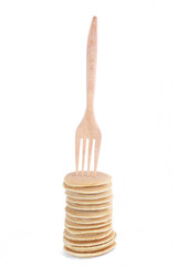 Stack of mini pancake isolated on white